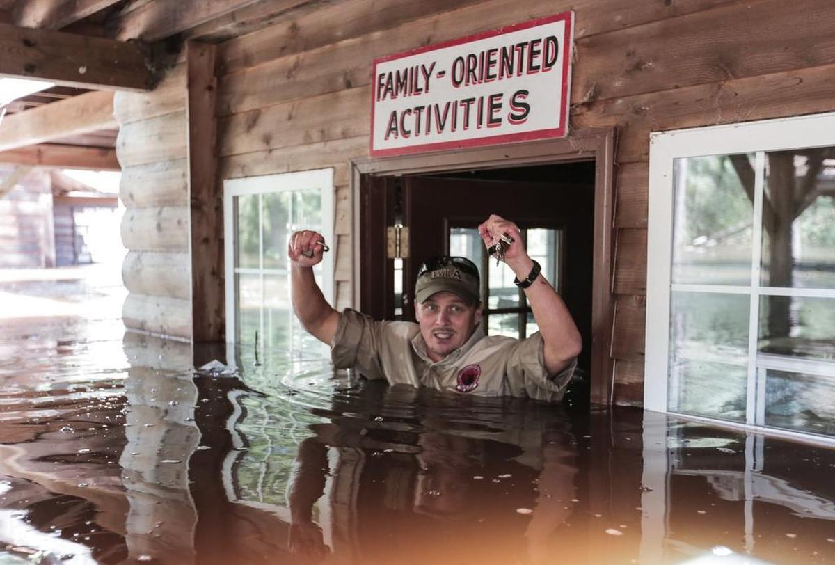 Frank Oliver enters the Wildlife Action center to turn off the power in the Fork Retch community October 11, 2016. Hurricane Matthew left homes beneath 17 feet of water in the Pee Dee region, particularly in the towns of Mullins and Nichols.
