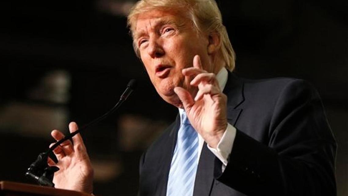 FILE - In this Nov. 23, 2015, file photo, Republican presidential candidate Donald Trump speaks in Columbus, Ohio. While the White House condemns Donald Trump's call for a ban on Muslim immigrants, President Barack Obama may only have himself to blame if a President Trump ever tries to put his plan into action.