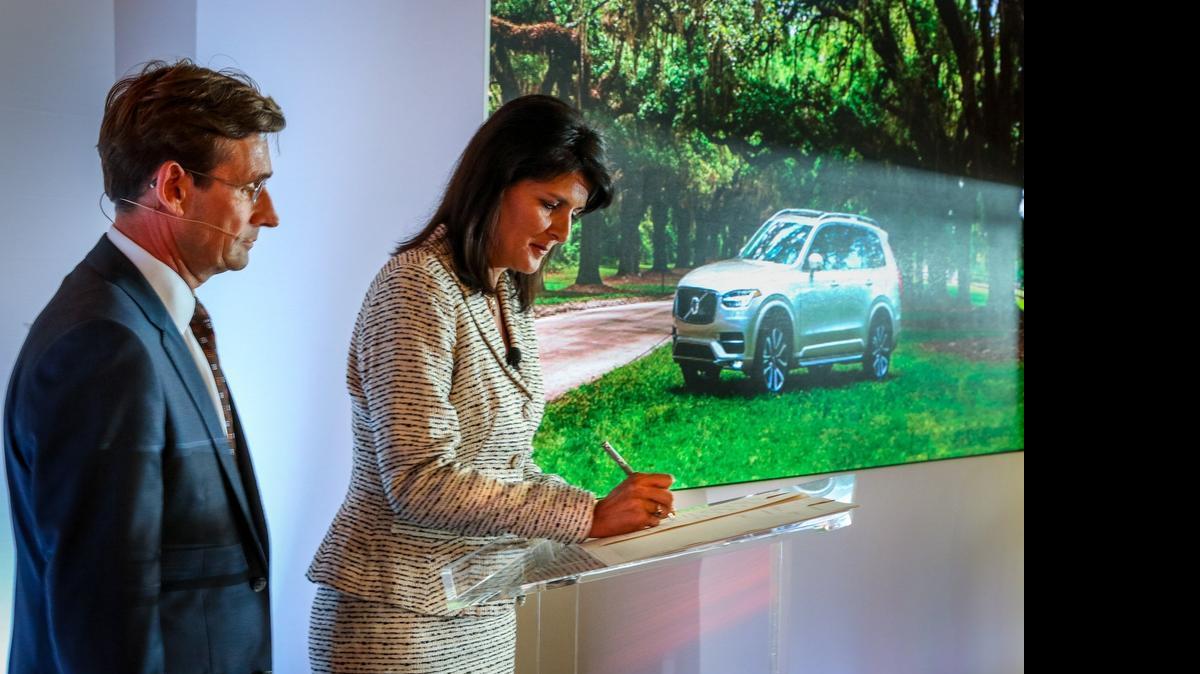 
Lex Kerssemakers, Volvo’s North America CEO, and Gov. Nikki Haley sign  ceremonial agreement for the automaker to build a plant in Berkeley County.

