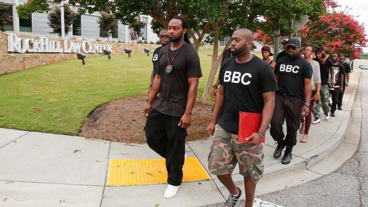 In this July 2016 file photo, the group Concerned Black Men of the city of Rock Hill march to the Rock Hill Law Center to deliver a letter of grievances to the Rock Hill Police Department.