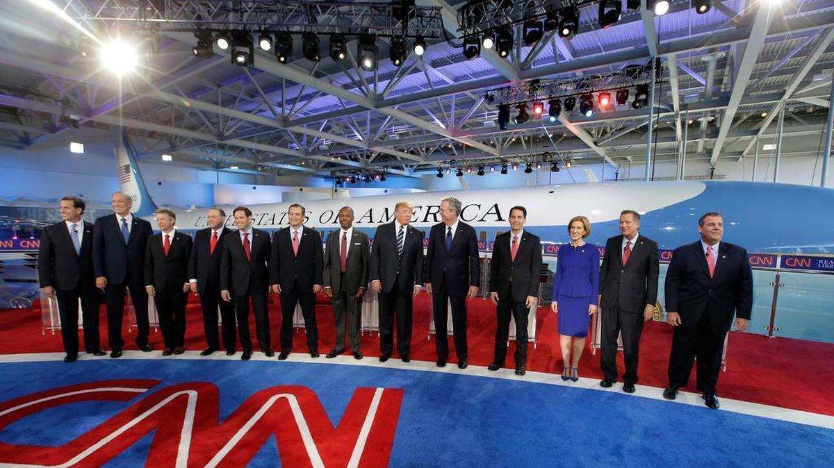
Republican presidential candidates, from left, former Pennsylvania Sen. Rick Santorum, former New York Gov. George Pataki, Sen. Rand Paul, R-Ky., former Arkansas Gov. Mike Huckabee, Sen. Marco Rubio, R-Fla., Sen. Ted Cruz, R-Texas, retired neurosurgeon Ben Carson, businessman Donald Trump, former Florida Gov. Jeb Bush, Wisconsin Gov. Scott Walker, businesswoman Carly Fiorina, Ohio Gov. John Kasich, and New Jersey Gov. Chris Christie take the stage during the CNN Republican presidential debate at the Ronald Reagan Presidential Library and Museum on in Simi Valley, Calif.
