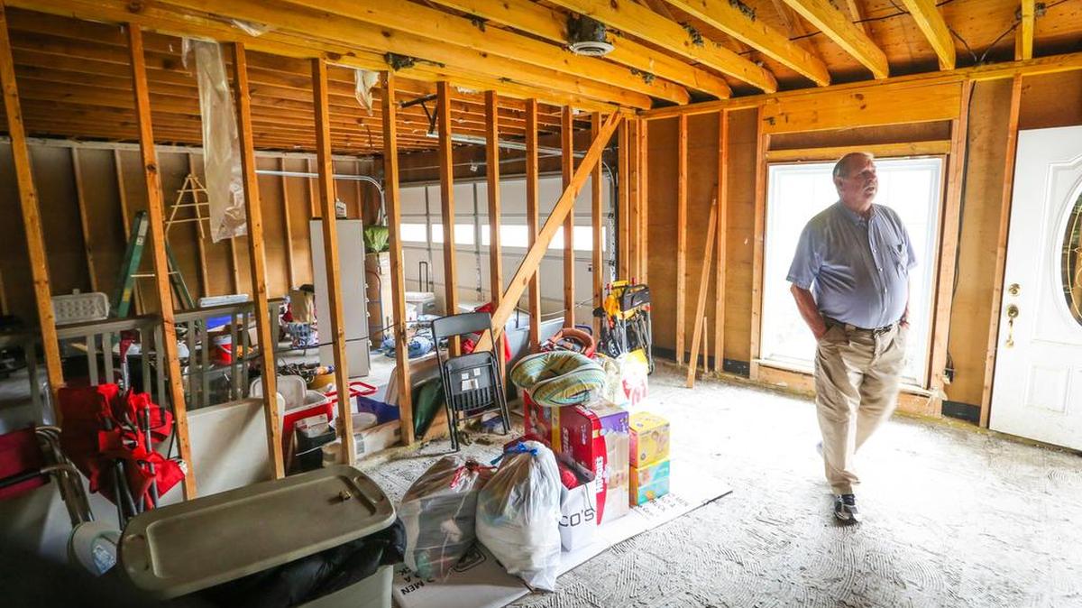 Dan Gay walks through his flood-damaged home in the Pine Glen subdivision of Lexington County last month. Some bills pre-filed in the S.C. Legislature would provide tax relief to residents whose homes were damaged by flooding.