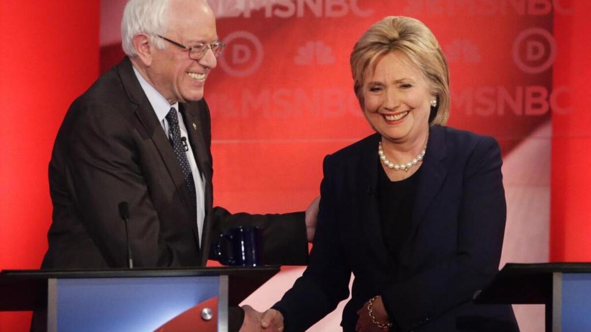 Democratic presidential candidate, Sen. Bernie Sanders, I-Vt, and Democratic presidential candidate, Hillary Clinton shake hands after a Democratic presidential primary debate hosted by MSNBC at the University of New Hampshire Thursday, Feb. 4, 2016, in Durham, N.H.