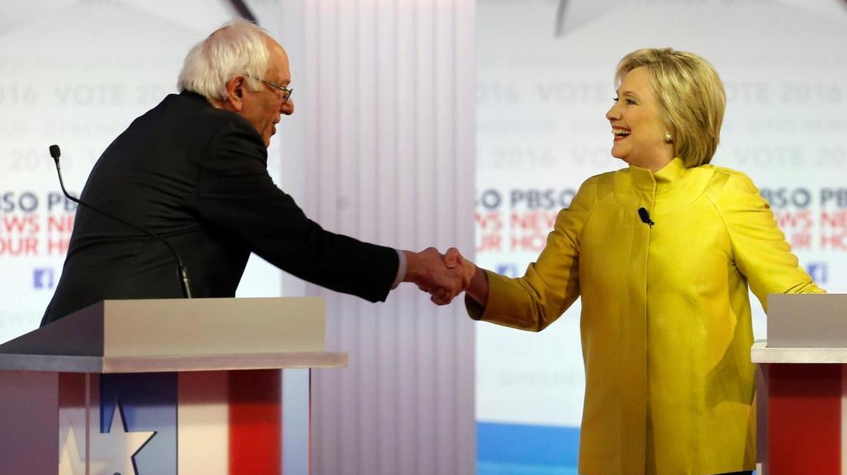 Democratic presidential candidates, Sen. Bernie Sanders, I-Vt, and Hillary Clinton shake hands after a Democratic presidential primary debate at the University of Wisconsin-Milwaukee on Feb. 11.