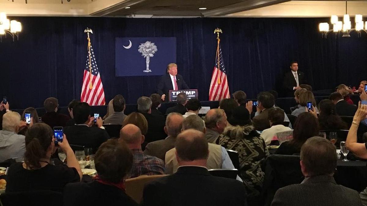 Republican presidential candidate Donald Trump speaks at a Holiday Inn in Mount Pleasant on Monday.
