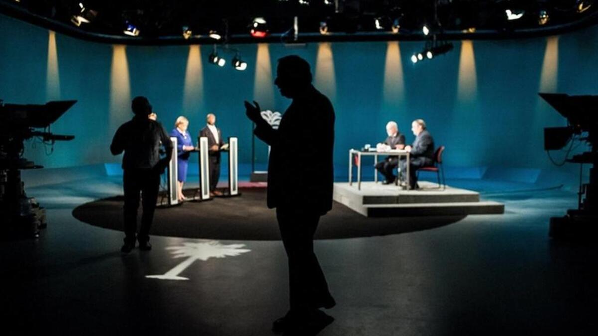 FILE PHOTO: Jill Bossi, Joyce Dickerson and US Senator Tim Scott took part in a debate at the ETV studios in Columbia, SC in October 2014.