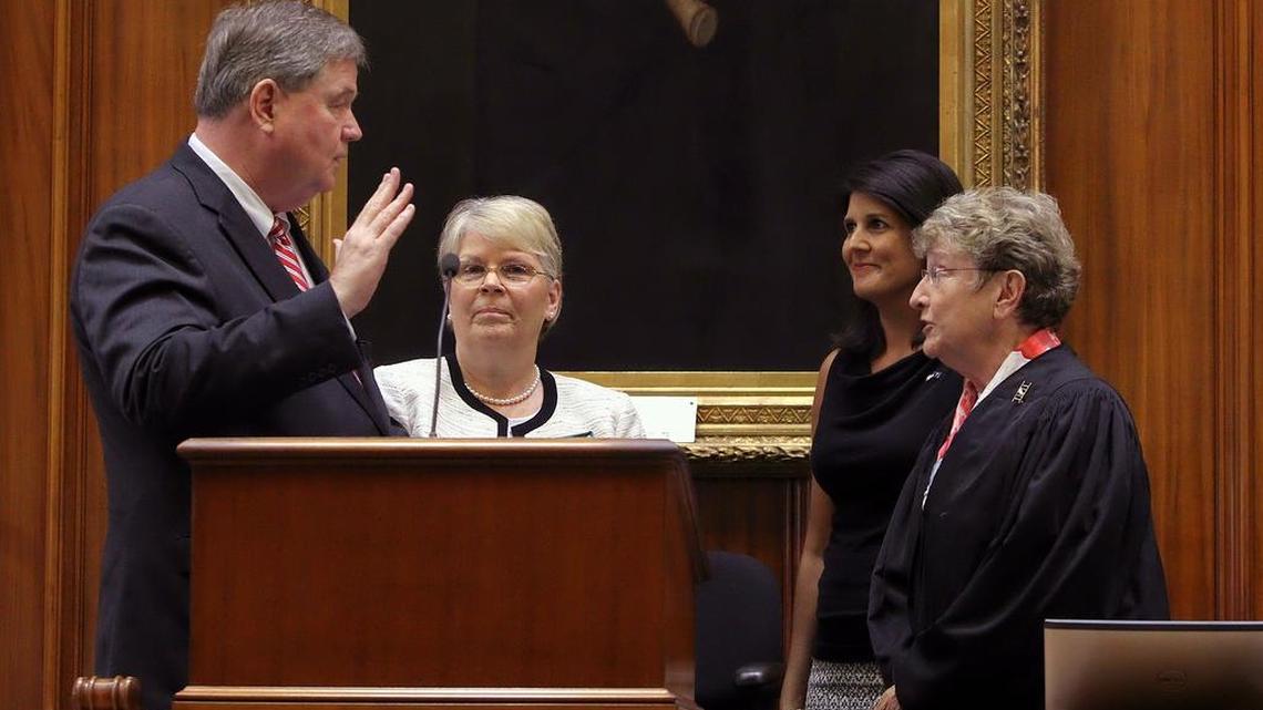 Then-S.C. President Pro Tempore Yancey McGill is sworn in as lieutenant governor by S.C. Supreme Court Chief Justice Jean Toal in 2014 while his wife, Pamela, and Gov. Nikki Haley watch.