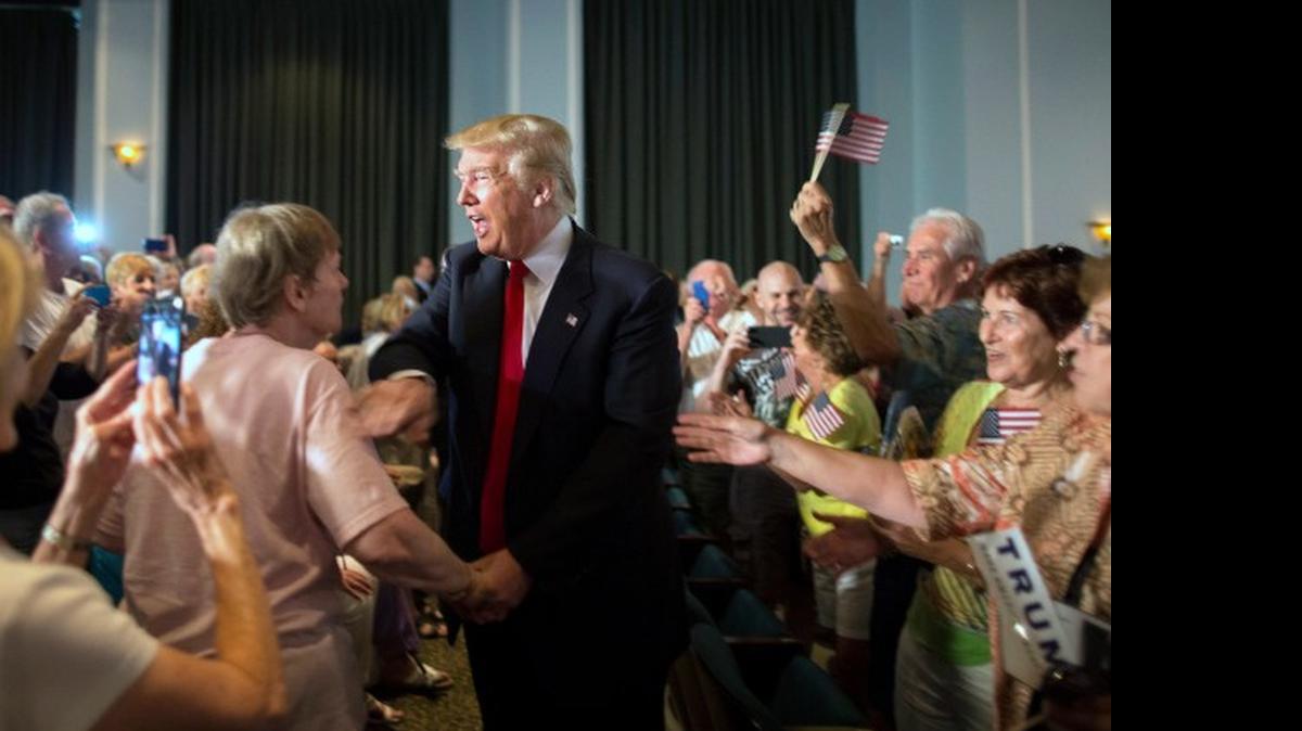 Republican presidential hopeful Donald Trump greets supporters Tuesday at a campaign rally in Bluffton.