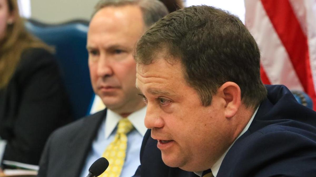 Senators Lee Bright and Joel Lourie listen to testimony during a Senate subcommittee hearing to consider a bill that would ban transgender people from choosing the bathroom they use.