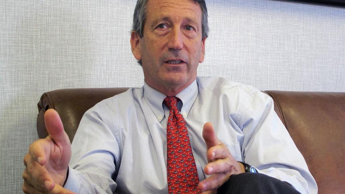 FILE - In this Dec. 18, 2013, file photo, U.S. Rep. Mark Sanford, R-S.C., discusses his first months back in Congress during an interview in Mount Pleasant, S.C.