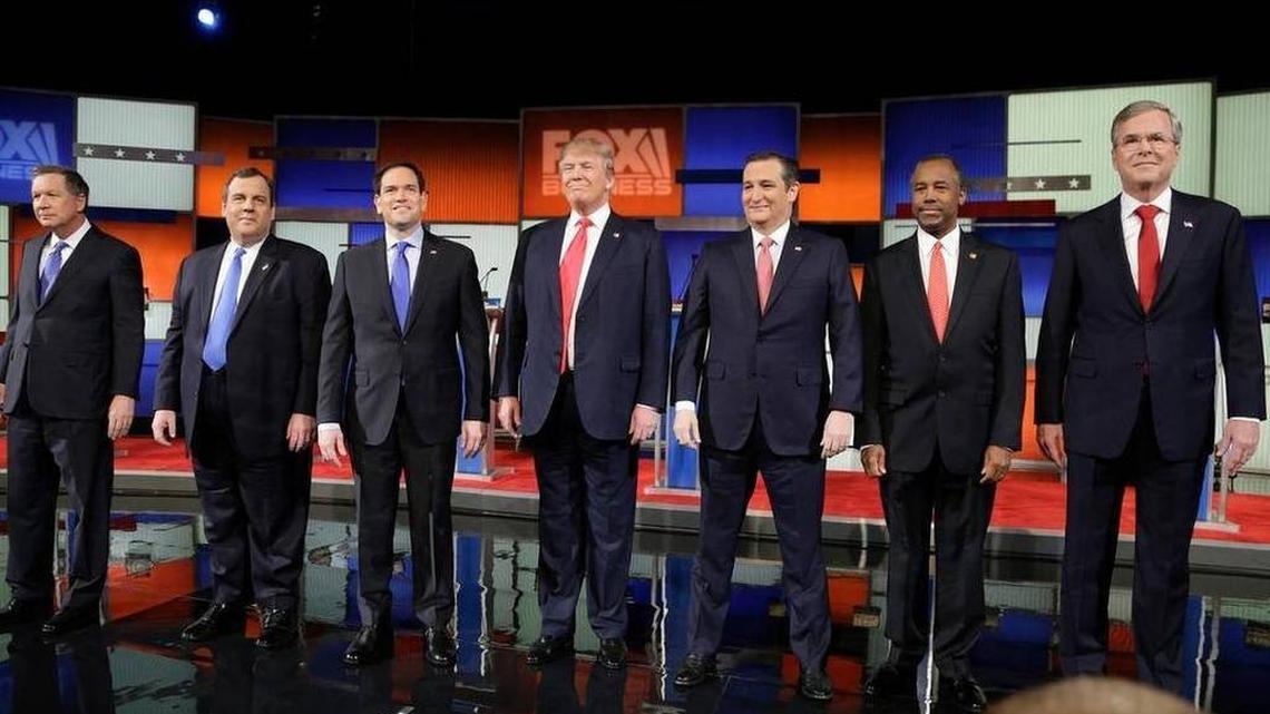 Republican presidential candidates, from left, Ohio Gov. John Kasich, New Jersey Gov. Chris Christie, Sen. Marco Rubio, R-Fla., businessman Donald Trump, Sen. Ted Cruz, R-Texas, retired neurosurgeon Ben Carson and former Florida Gov. Jeb Bush take the stage before the Fox Business Network Republican presidential debate at the North Charleston Coliseum on Thursday.