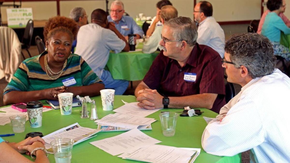 Pastors, as well as church and community members, joined in round-table discussion at the Racial Bridging Focus Group Pastors’ Breakfast on Wednesday.