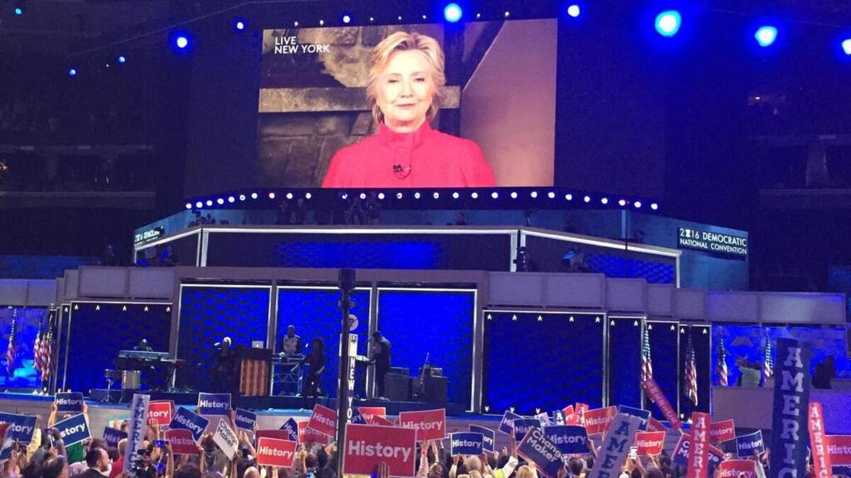 Hillary Clinton appeared in a video message in which she symbolically shattered the “glass ceiling” as the Democratic Party’s official nominee