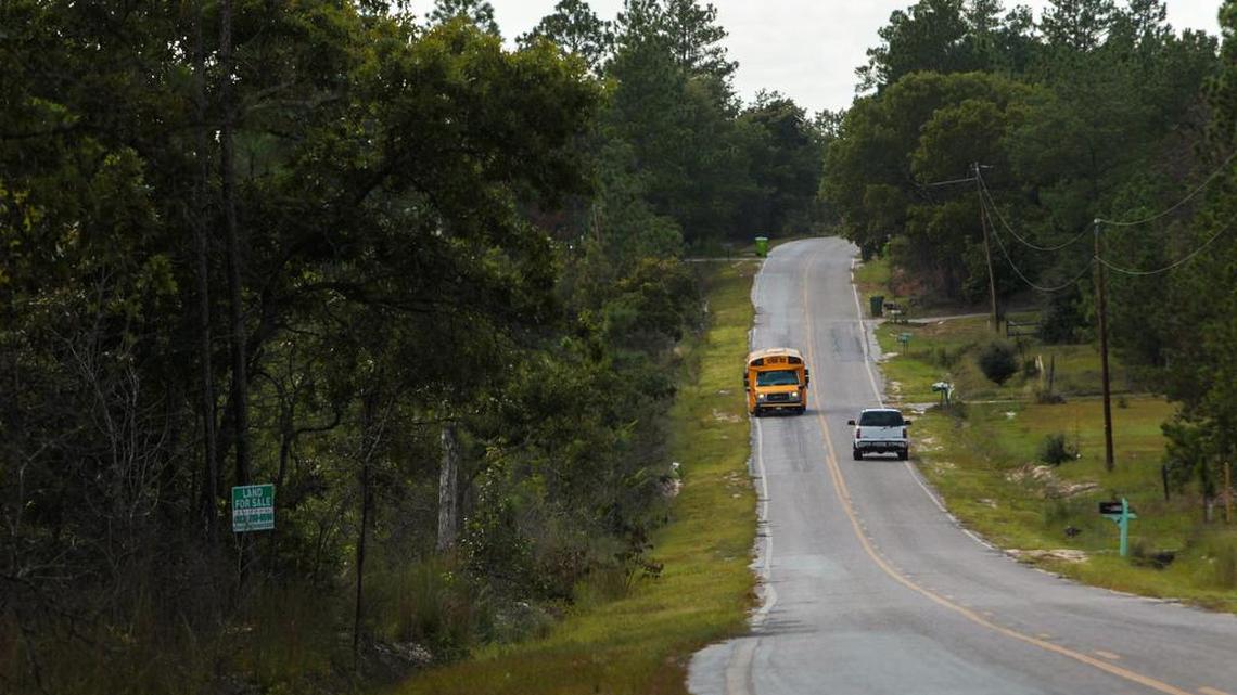 A school bus travels through Lower Richland on Monday, dropping off riders.