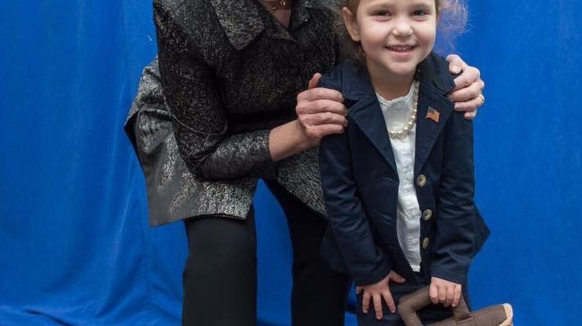 At an earlier campaign event, 5-year-old Sullivan Wood of Charleston got her picture taken with Hillary Clinton in her “Tiny Hillary” Halloween costume. Sullivan made the trip to Charlotte on Tuesday with her mom and sister for Clinton’s first joint appearance with Barack Obama.