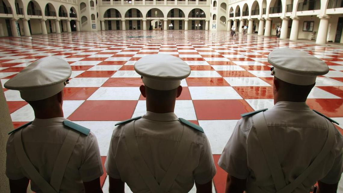 In this file photo, cadets at The Citadel stand inside the military college based in Charleston, S.C. This week, the South Carolina school has been embroiled in controversy after one of its graduates created and posted a racist social media post just days into Black History Month.