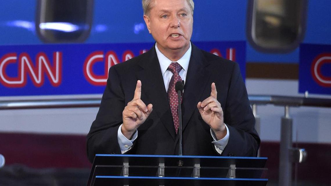 
Republican presidential candidate, Sen. Lindsey Graham, R-S.C., answers a question during the CNN Republican presidential debate at the Ronald Reagan Presidential Library and Museum on Wednesday in Simi Valley, Calif. 
