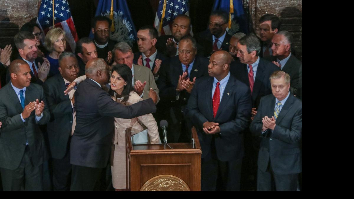 
Gov. Nikki Haley hugs U.S. Rep. Jim Clyburn, D-Columbia, after she called for legislators to remove the Confederate flag from the grounds of the State House during a news conference on June 22.
