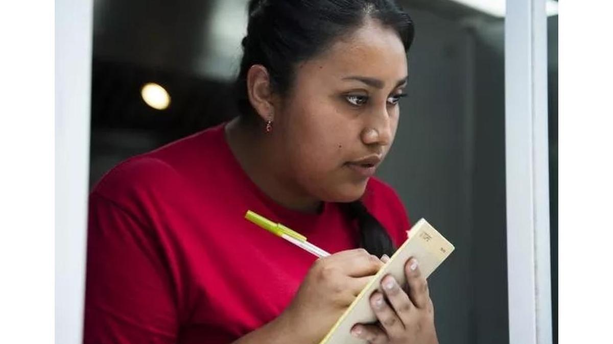 Erika Hernandez, 20, takes a customer's order at Taqueria Mixtepec in west Greenville on Thursday, June 29, 2017. Hernandez first came to the country when she was six and is one of 750,000 Dreamers in the country.