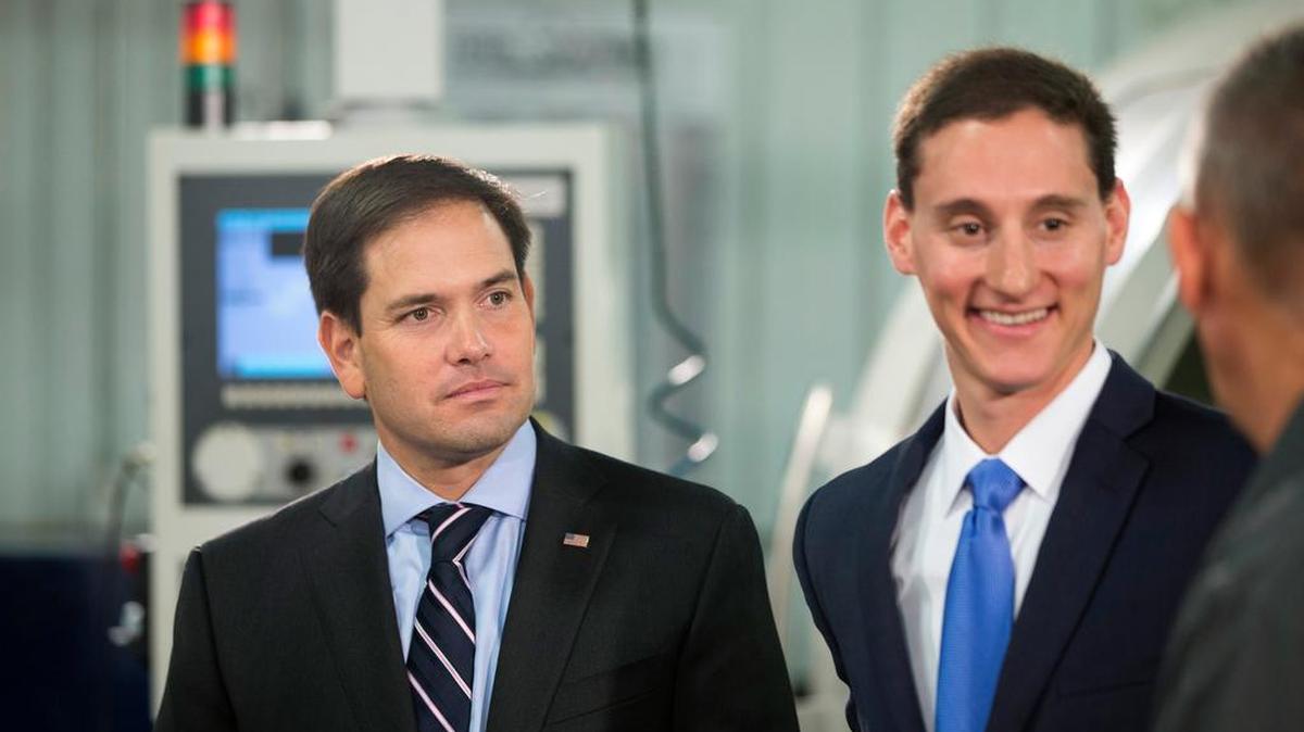 Republican presidential candidate, Sen. Marco Rubio, R-Fla., accompanied by Ohio State Treasurer Josh Mandel, talks to workers during a stop at BOC Water Hydraulics, Friday, October 16, 2015, in Salem, Ohio.
