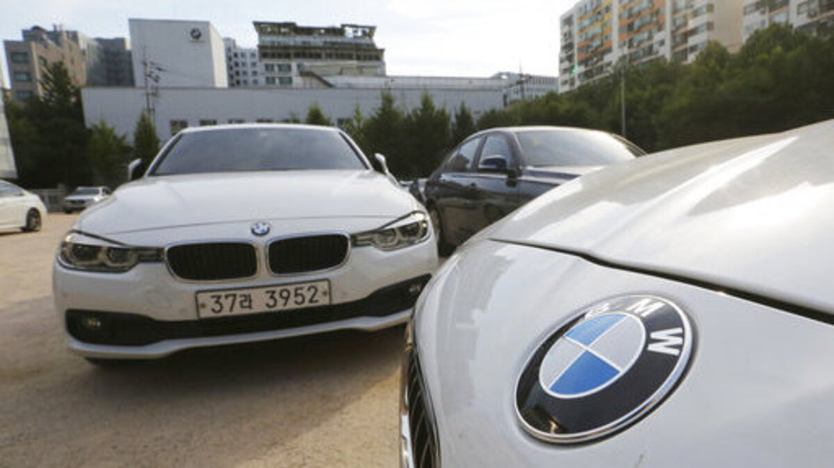 BMW cars are parked for an emergency safety check at the playground of an elementary school near a BMW service center in Seoul, South Korea, Tuesday, Aug. 14, 2018. South Korea will ban driving recalled BMWs that haven’t received safety checks following dozens of fires the German automaker has blamed on a faulty exhaust gas component.