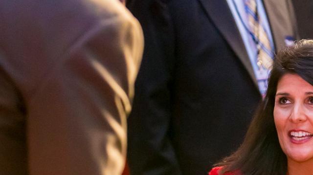 
South Carolina Governor Nikki Haley chats at the South Carolina Republican Silver Elephant dinner at the Columbia Convention Center. 
