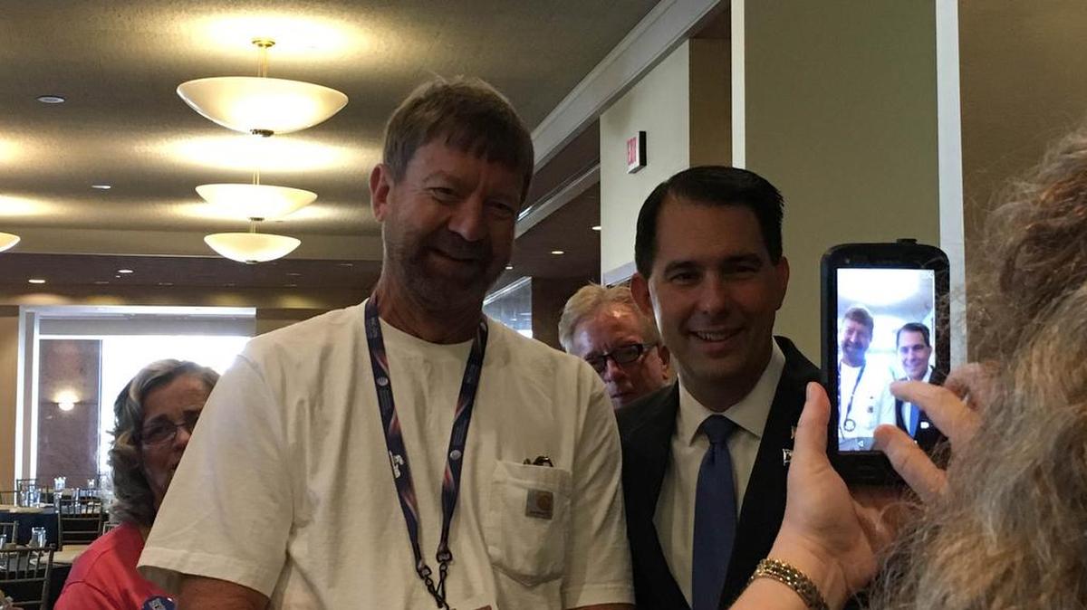 Wisconsin Gov. Scott Walker poses for a picture with S.C. RNC delegate K.C. Lombard of Charleston.
