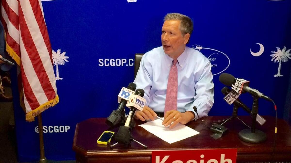 
Ohio Gov. John Kasich speaks to reporters Monday after registering for the 2016 S.C. Republican presidential primary at the state GOP headquarters in Columbia. 
