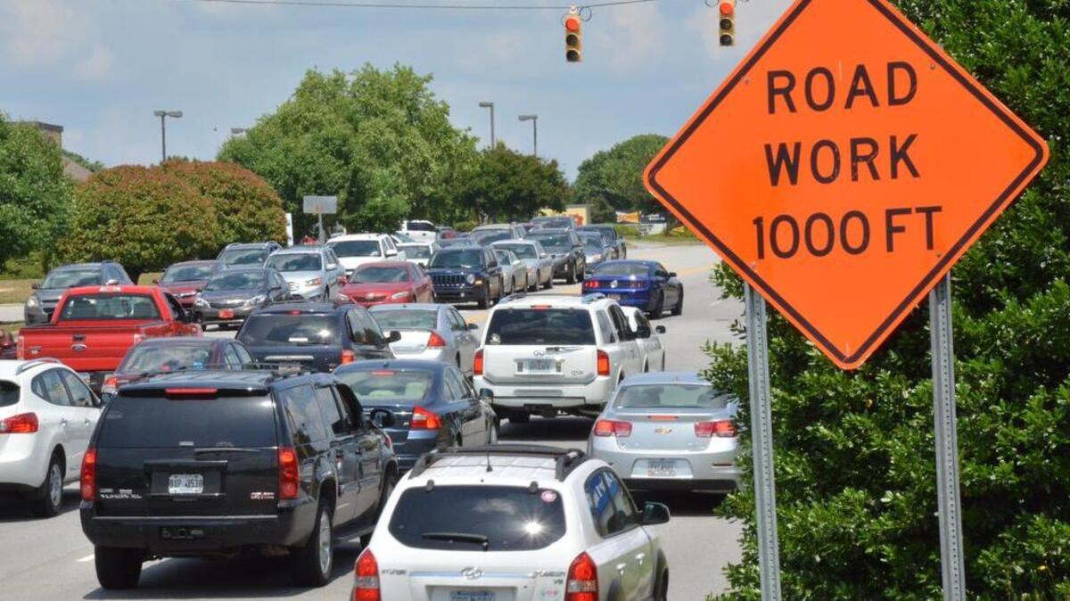
Traffic creeps along Haribson Boulevard midday 
