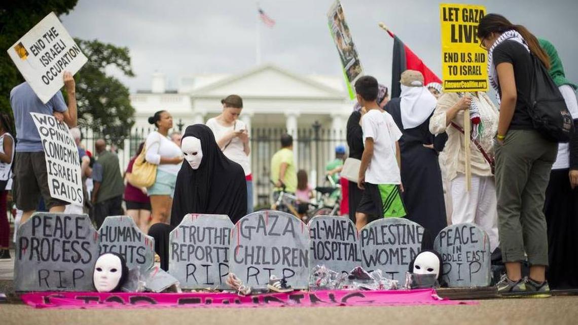 Protestors gather in front of the White House in Washington during a demonstration against Israel's military offensive in the Gaza Strip, Sunday, July 20, 2014.