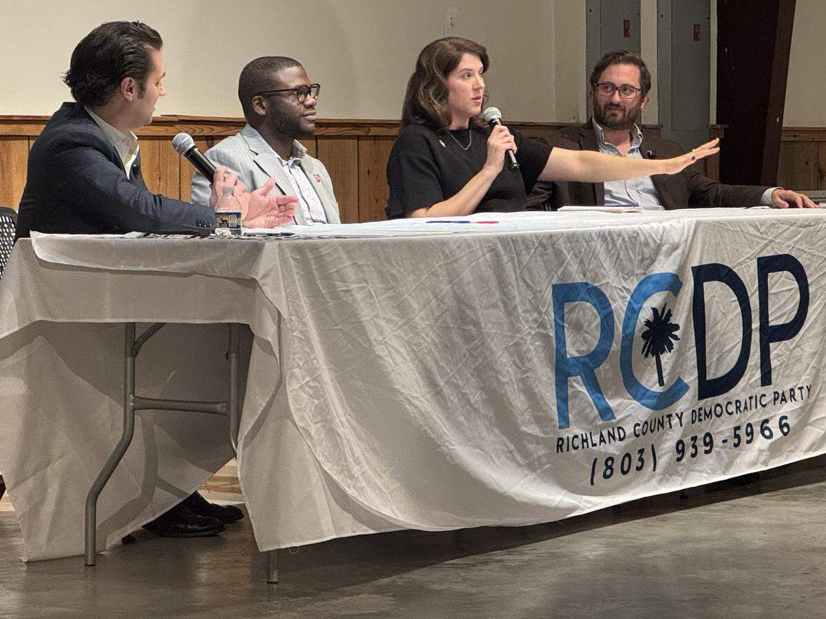 State Rep. Kambrell Garvin, D-Richland (second from left), and state Rep. Heather Bauer, D-Richland (second from right), speak to the Richland County Democratic Party on Tuesday, Sept. 30, 2025, about strategies the Democratic caucus can use in the state House in 2026.