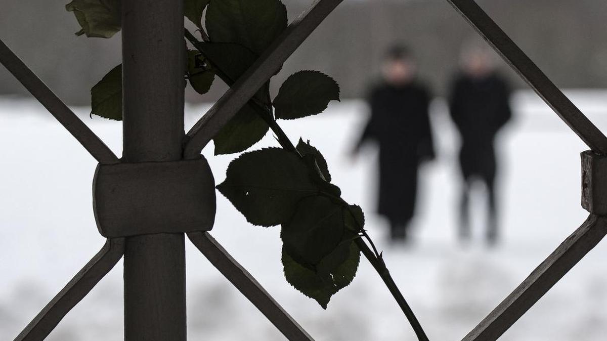 A rose hung in 2015 on the entrance gate during the international Holocaust remembrance day in the former Nazi Buchenwald concentration camp near Weimar, Germany.
