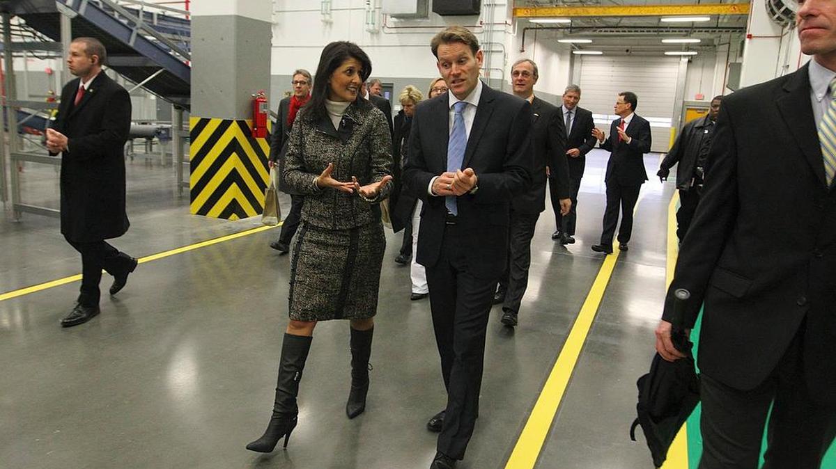 Gov. Nikki Haley gets a tour of the production line by Nikolai Setzer, Executive Board Member of Continental AG during the grand opening of Continental's Sumter plant.