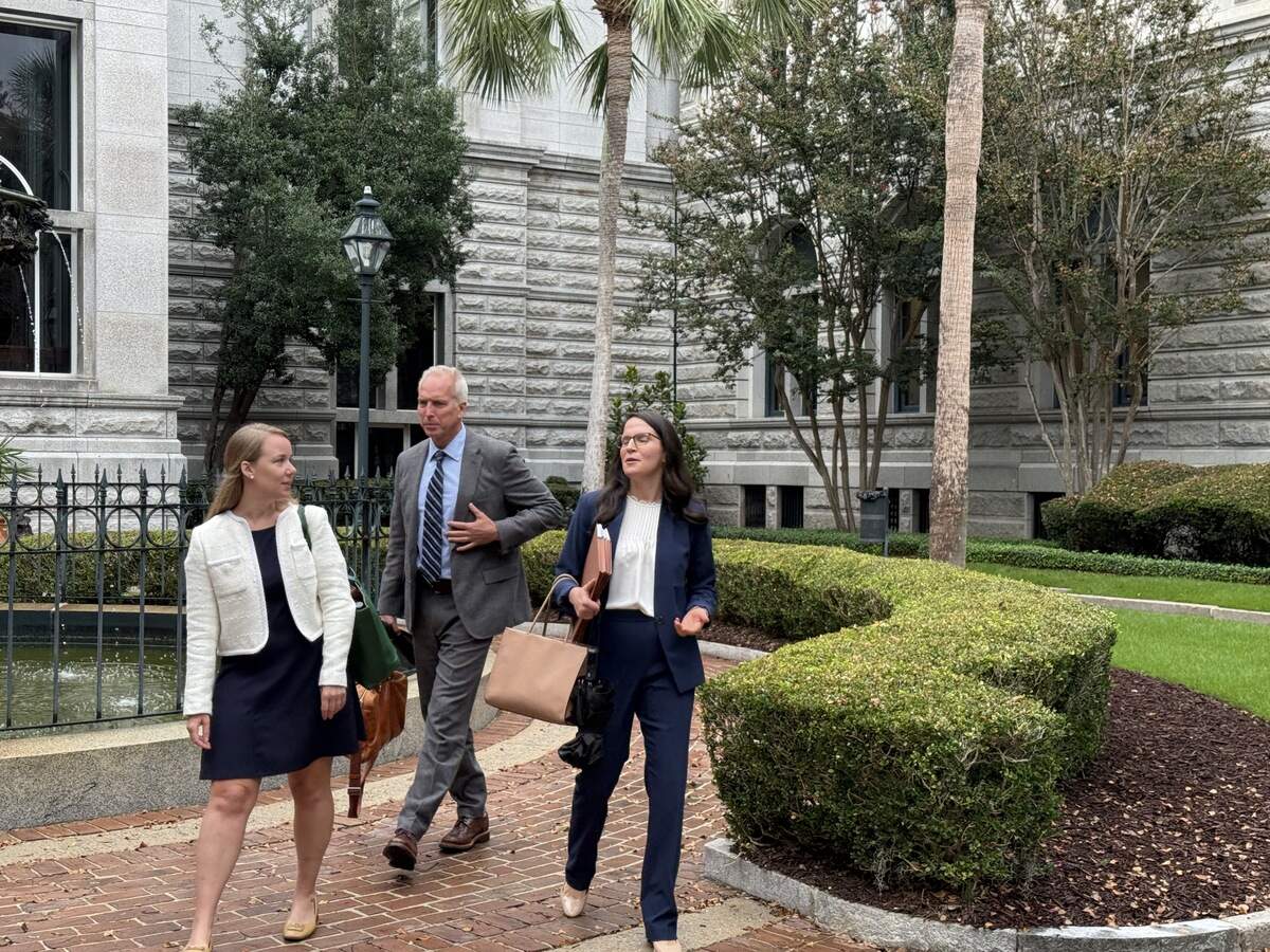 Federal prosecutors in the Russell Laffitte case, from left to right, Katie Stoughton, Winston Holliday and Emily Limehouse, leave federal court in Charleston on Monday, Sept. 29, 2025.