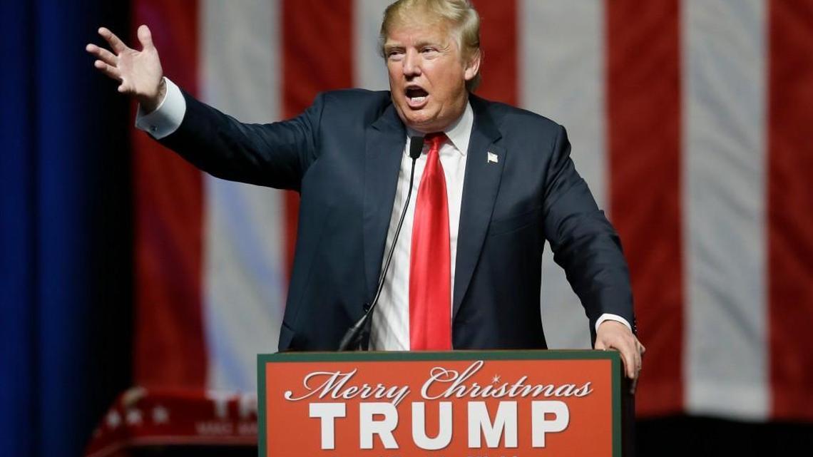 Republican presidential candidate and businessman Donald Trump addresses supporters at a campaign rally Dec. 21 in Grand Rapids, Mich.