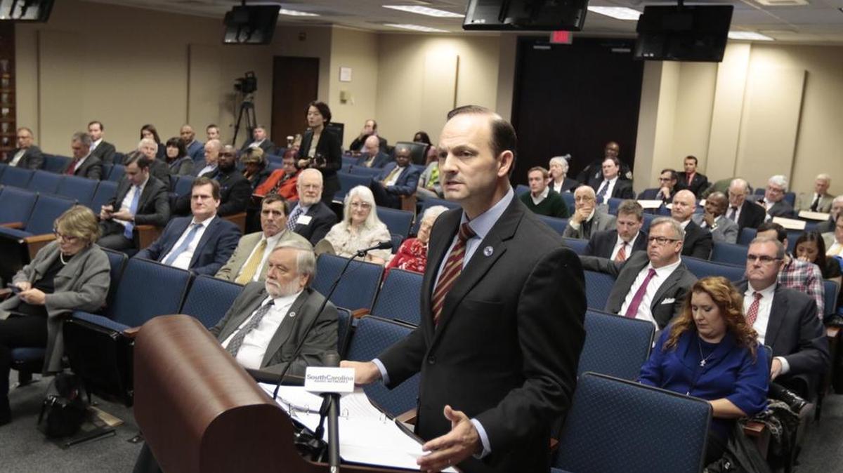 S.C. Attorney General Alan Wilson speaks on behalf of the residents of South Carolina during a hearing of the Public Service Commission.