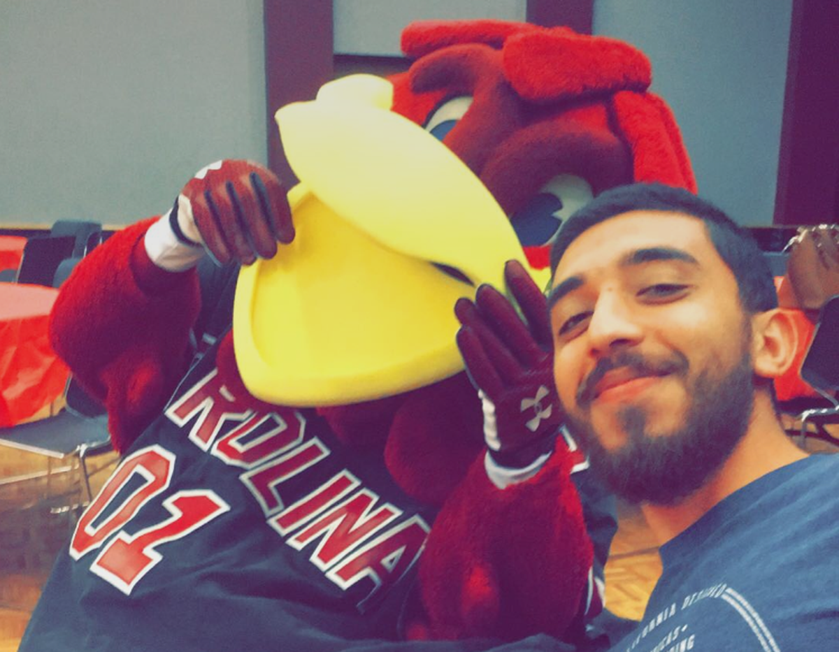 Hasan Alibadi meets Cocky. Hasan’s brother Zaid is a graduate student at the University of South Carolina.
