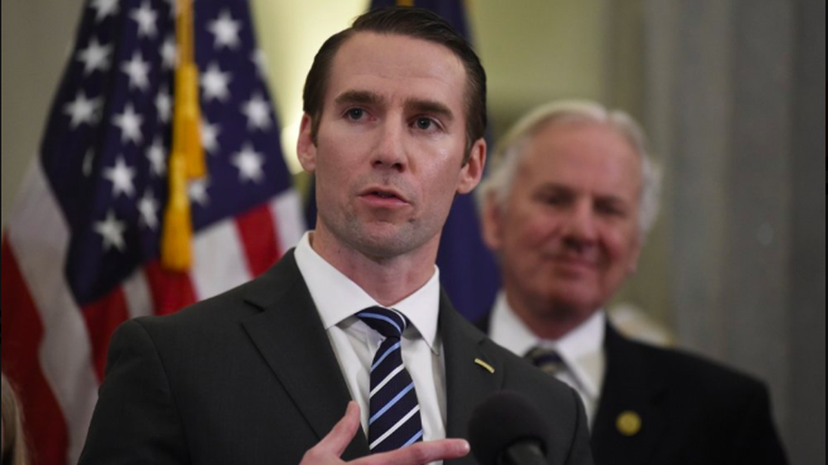 South Carolina state Rep. Bobby Cox, left, speaks after Gov. Henry McMaster, right, introduces Cox as his pick to lead the state’s veterans’ affairs agency, on Wednesday, Dec. 11, 2019, at a news conference in Columbia, S.C. (AP Photo/Meg Kinnard)