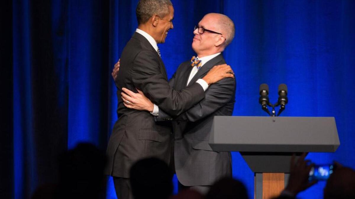 
President Barack Obama greets Jim Obergefell, the named plaintiff in the same-sex marriage case decided by the U.S. Supreme Court, as he is welcomed to the stage to speak at a Democratic National Committee LGBT fundraising gala, Sunday, Sept. 27, 2015, held at Gotham Hall in New York. (AP Photo/Andrew Harnik)
