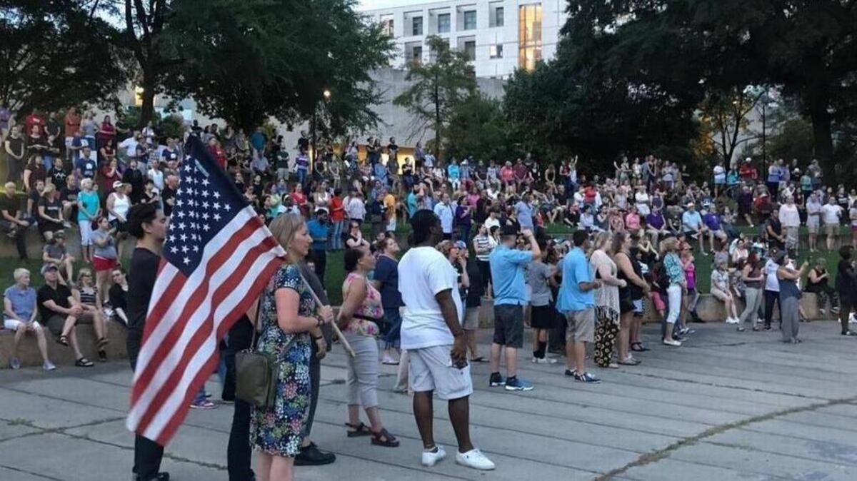 The scene at last weekend’s peaceful vigil in Marshall Park in the aftermath of violence in Charlottesville, Va.