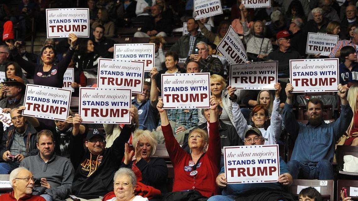 Donald Trump supporters hold up signs of support prior to rally at the Winthrop University Coliseum in Rock Hill, SC on Friday, January 8, 2016. A Winthrop University Poll last month found six out of 10 S.C. voters frustrated with the federal government, while more than a third described themselves as angry. Among Trump supporters, almost half – 47 percent – are angry.