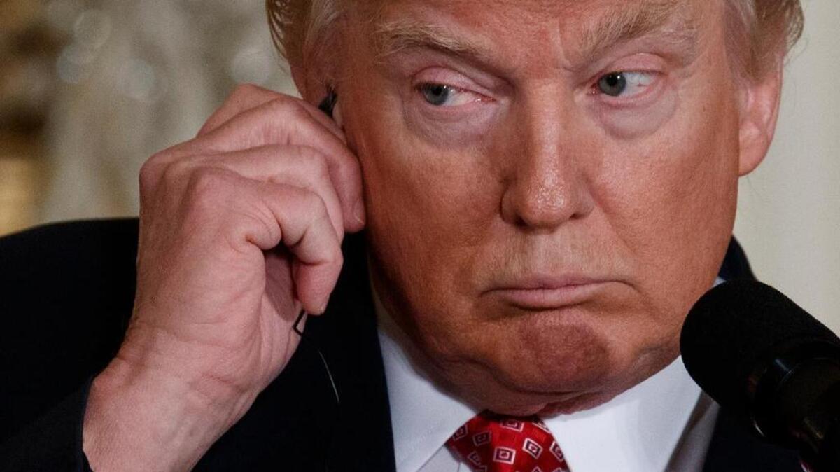In this Friday, Feb. 10, 2017, file photo, President Donald Trump listens to a translation as Japanese Prime Minister Shinzo Abe speaks during their joint news conference in the East Room of the White House in Washington.