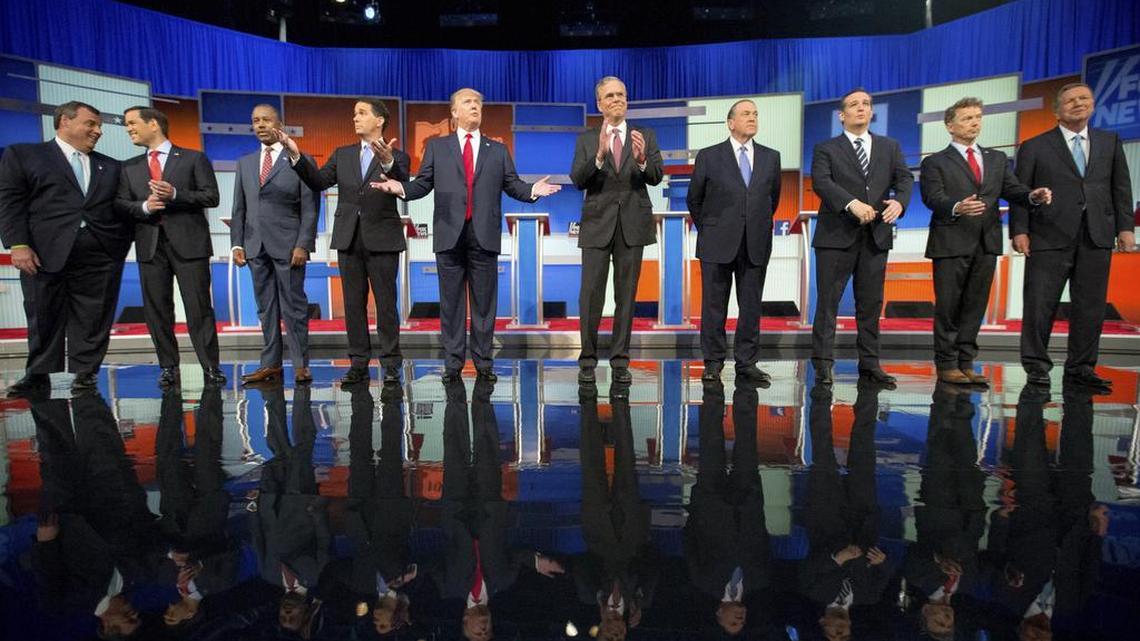 
Republican presidential candidates from left, Chris Christie, Marco Rubio, Ben Carson, Scott Walker, Donald Trump, Jeb Bush, Mike Huckabee, Ted Cruz, Rand Paul, and John Kasich take the stage for the first Republican presidential debate at the Quicken Loans Arena, Thursday, Aug. 6, 2015, in Cleveland, Ohio.
