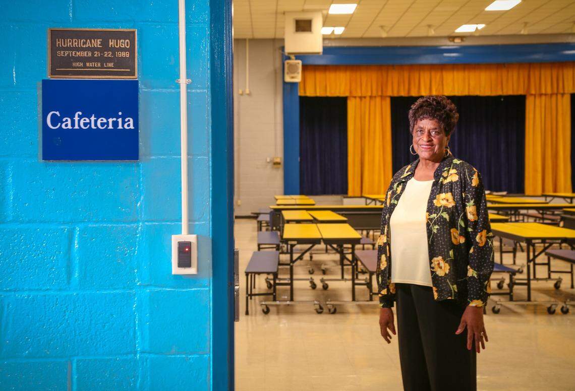 In this file photo, Elizabeth Young stands in front of the Lincoln High School cafeteria in McClellanville where Hurricane Hugo evacuees almost drowned in Sept. 1989. 9/9/14