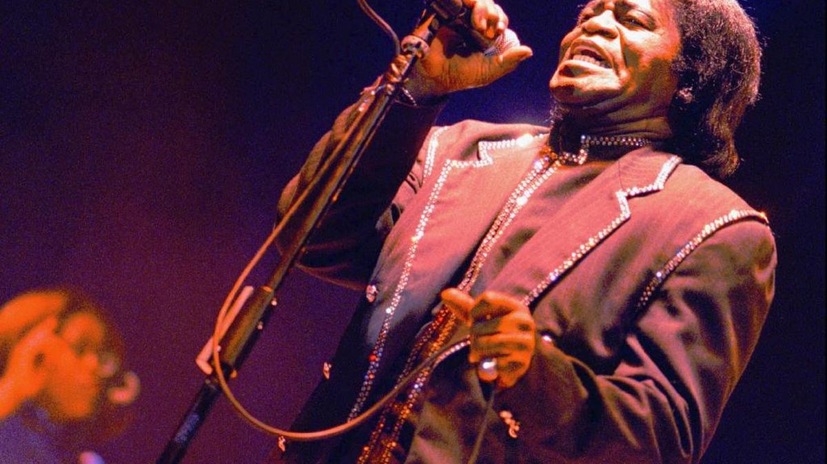 In this July 5, 1997 file photo, the ‘Godfather of Soul’, singer James Brown, performs during an open air festival in Eschenbach, near Luzern, Switzerland.