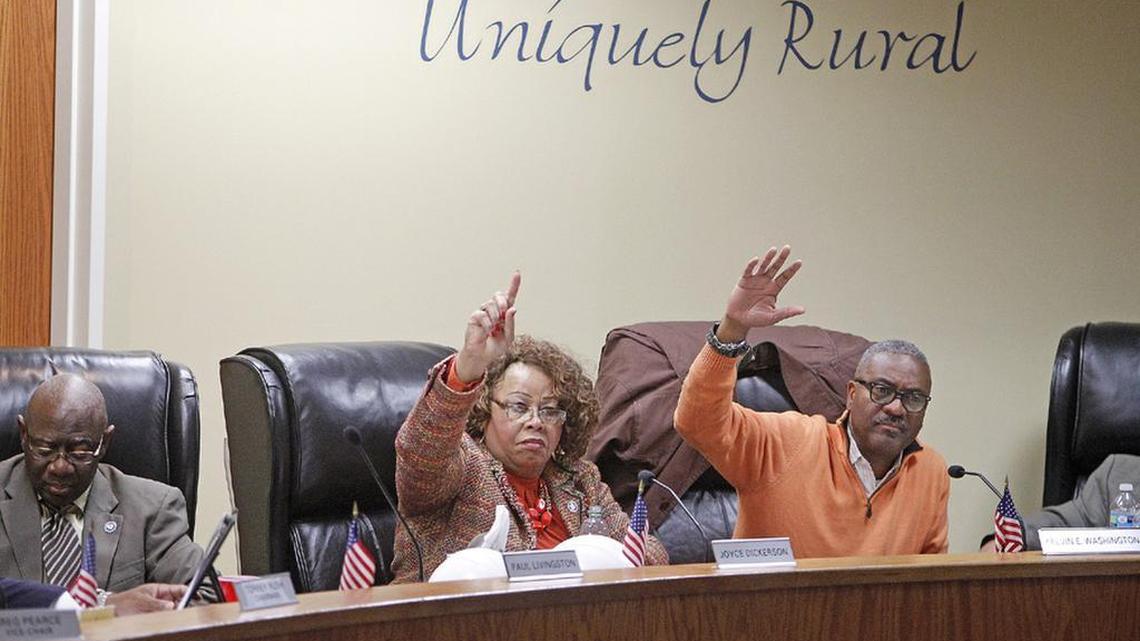 Richland County council members Joyce Dickerson and Kelvin Washington vote on a zoning request in November. The 1975 Home Rule Act allowed the creation of county councils.