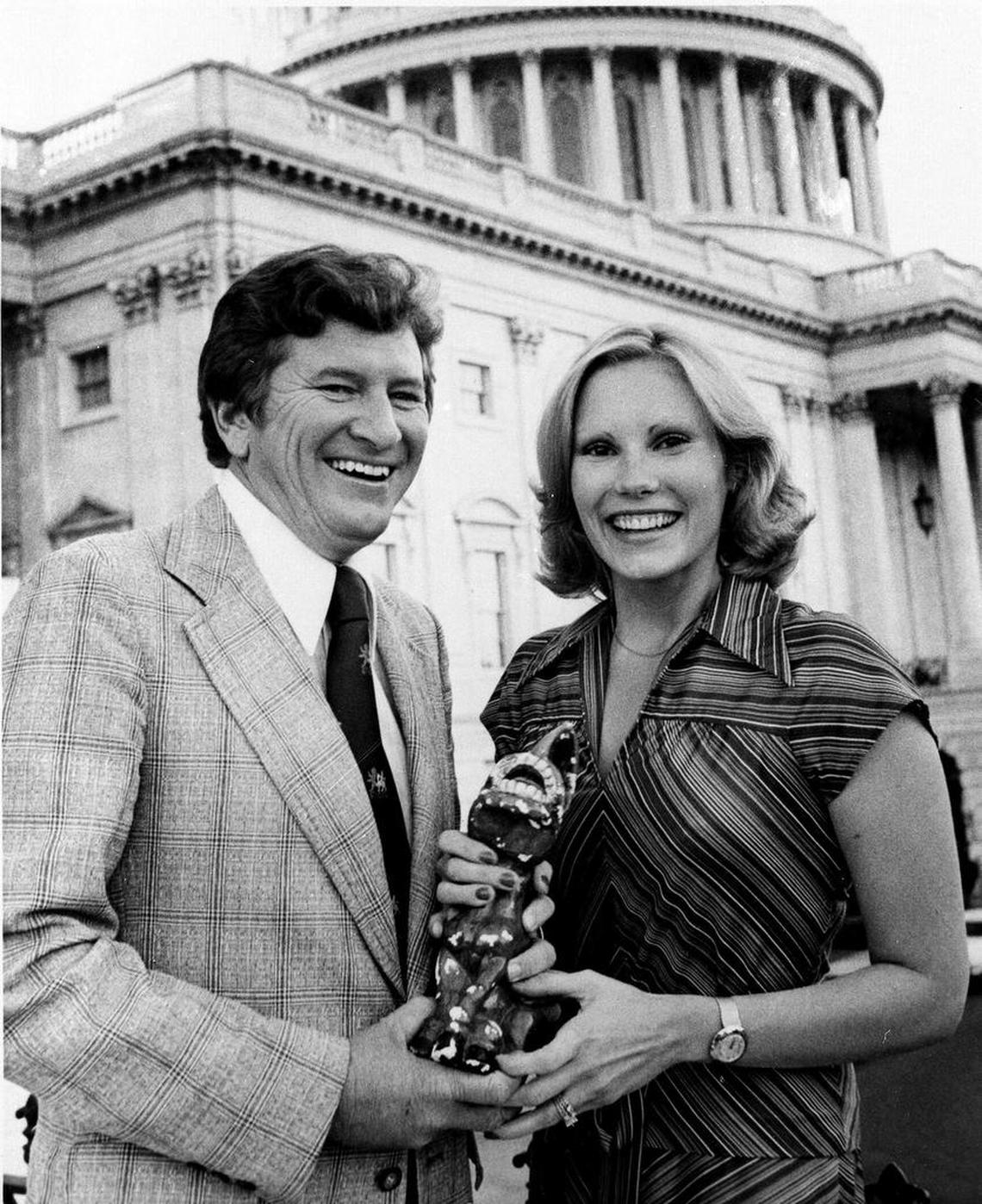 Then-Rep. John W. Jenrette Jr., D-S.C. held a glass donkey as he stood with his wife Rita outside the Capitol in Washington, D.C. in1976.