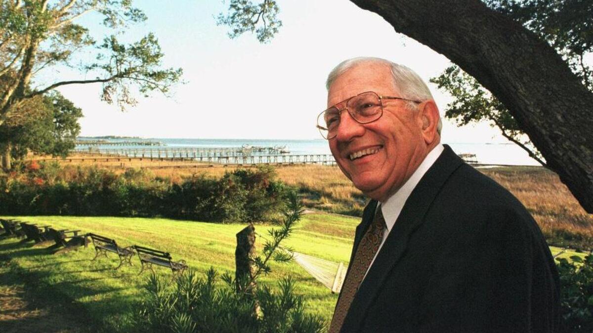 Former South Carolina Gov. James B. Edwards stands smiling on the porch of his home in Mount Pleasant, Wednesday Dec. 8, 1999, as he talked about his retirement Jan. 1. Edwards, 72, trained to be an oral surgeon has spent more than half his career doing other things, a term as governor, a state senate seat, energy secretary in the Reagan Administration and 17 years as president of the Medical University of South Carolina.