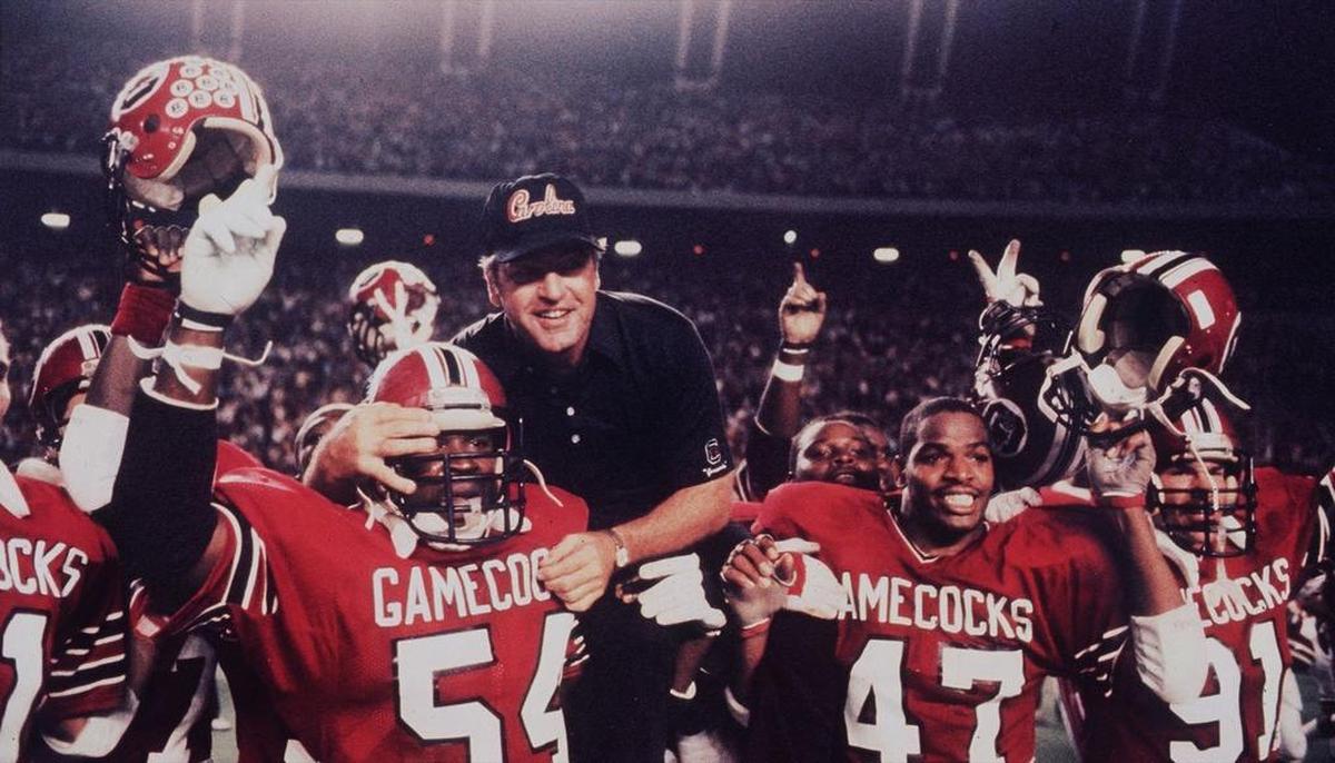 Then-USC CoachJoe Morrison and his players celebrate their win over Florida State during the 1984 Black Magic season. The win brought the Gamecocks to 9-0 and ranked No. 2 in the country.