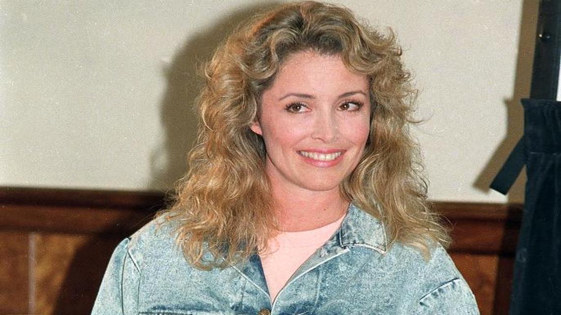 Model Donna Rice smiles during a news conference at the Water Club in New York City on Sept. 9, 1987. Rice, promoting her line of "No Excuses" denim, made headlines during the 1988 presidential campaign after the revelation of her affair with presidential candidate Gary Hart.